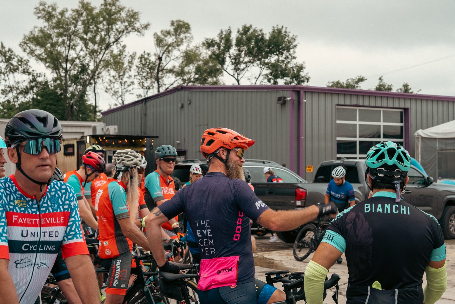 Cycling club riders talking before the start