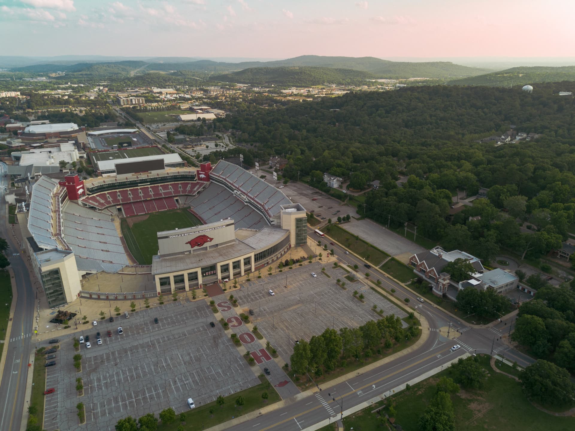 Aerial view of Fayetteville and the Ozark hills at sunset