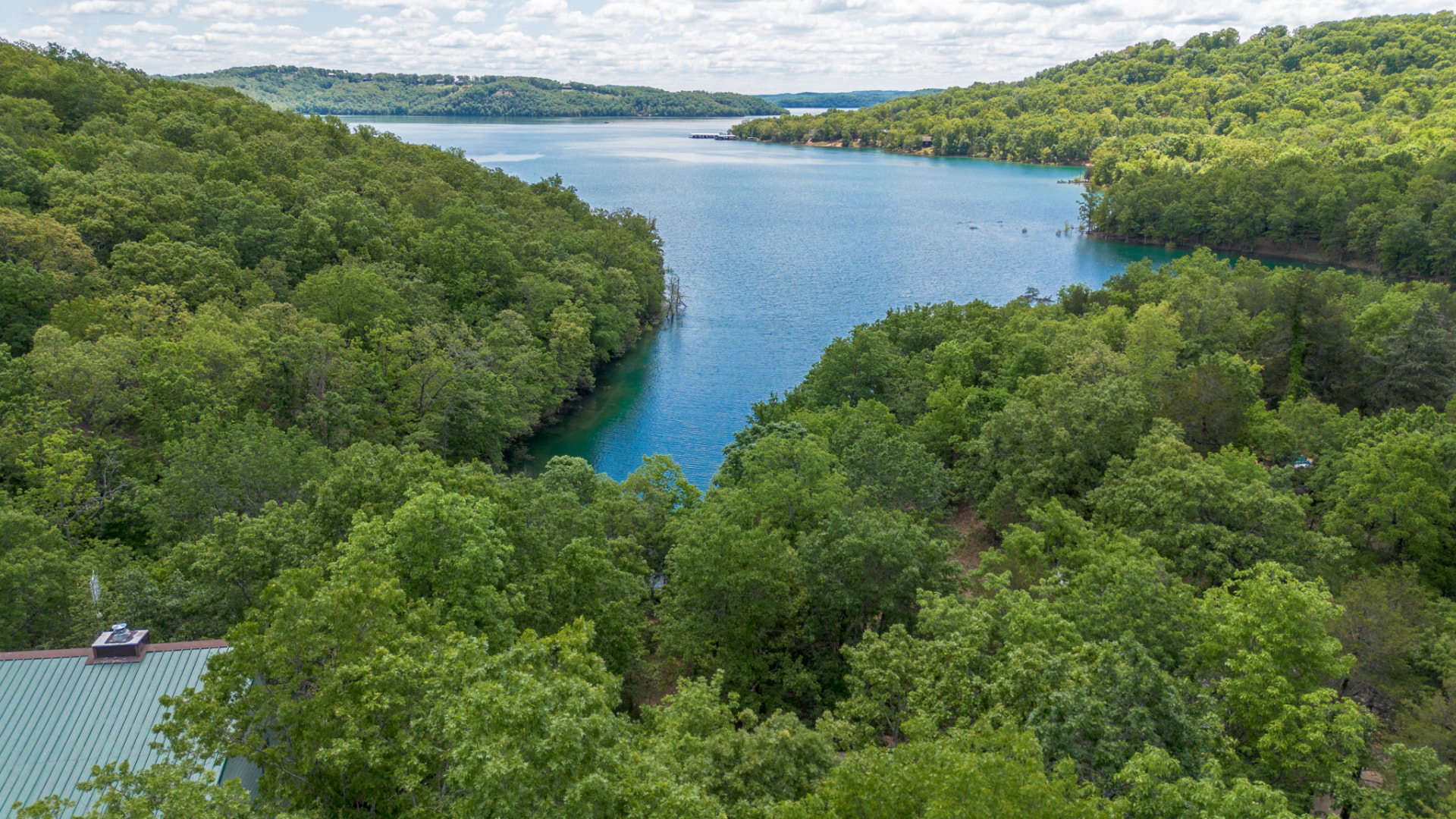 Aerial view of Beaver Lake coves and forested shoreline
